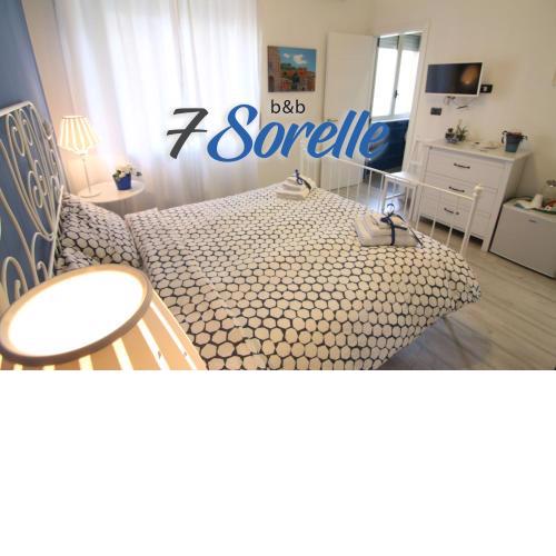 "7 SORELLE B&B" camere in pieno centro città con bagno privato, FREE HIGH SPEED WI-FI, NETFLIX